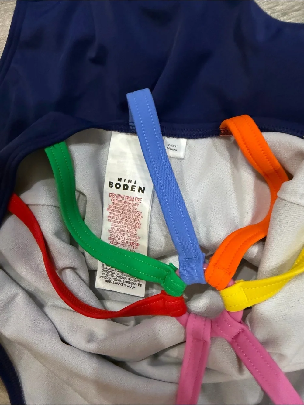 Mini Boden Navy One-Piece Swimsuit Rainbow Back straps and matching fruit shorts